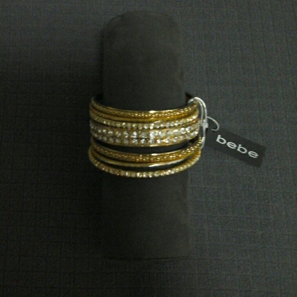 BEBÉ GOLDEN RHINESTONE PRINCESS BANGLES. - Picture 2 of 3